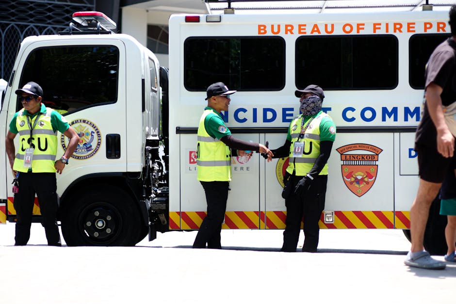 Security professional responding during a WordPress incident with a laptop showing an emergency alert