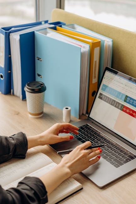 Technician comparing file timestamps and log entries during a website incident response