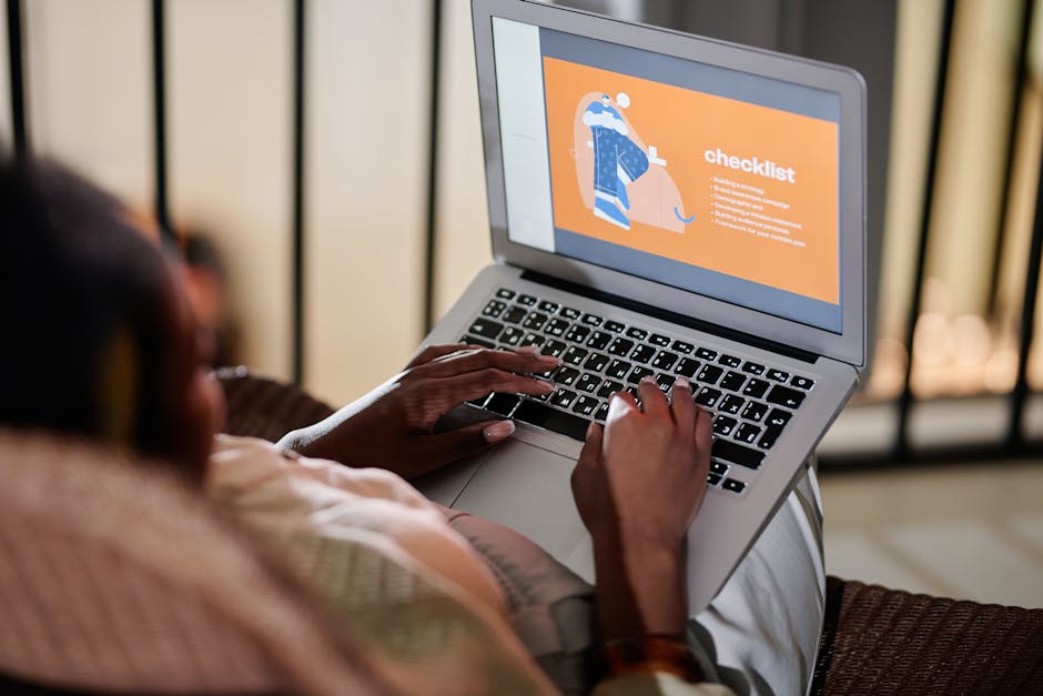 Person reviewing a security rollout checklist on a laptop with browser dev tools open