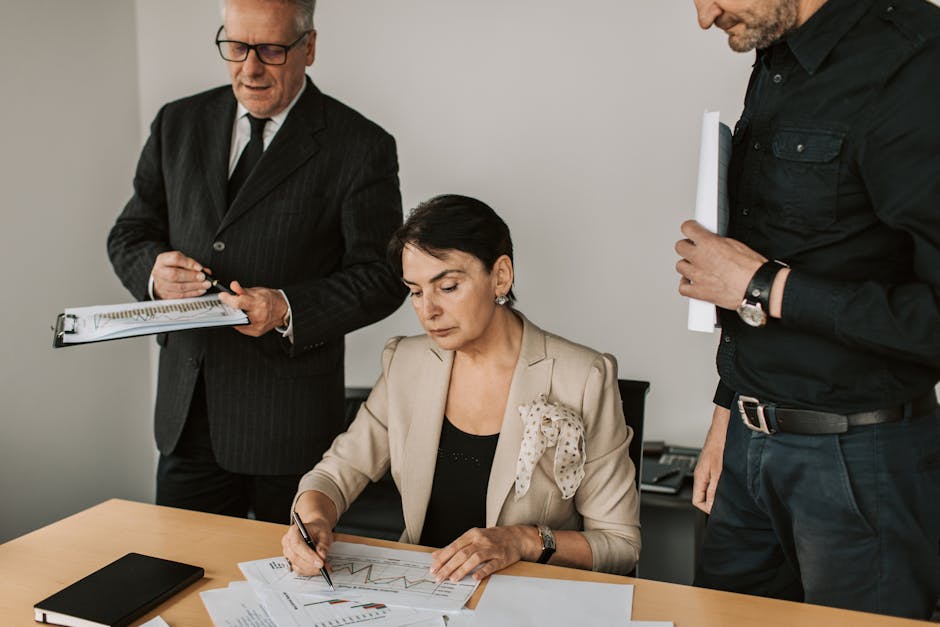 Security professional reviewing a computer dashboard, representing a layered WordPress defense plan