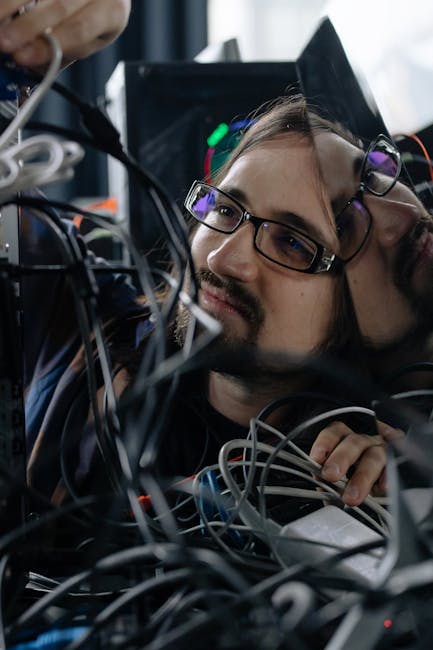 IT professional reviewing server files on a computer during SFTP recovery steps