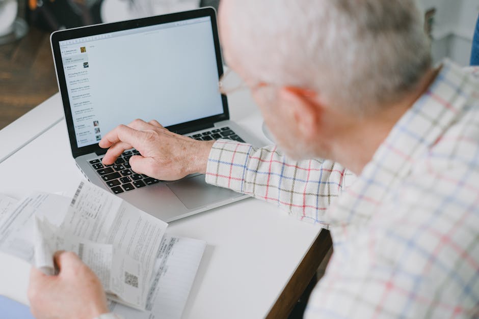 Web security expert reviewing suspicious login activity on a computer screen